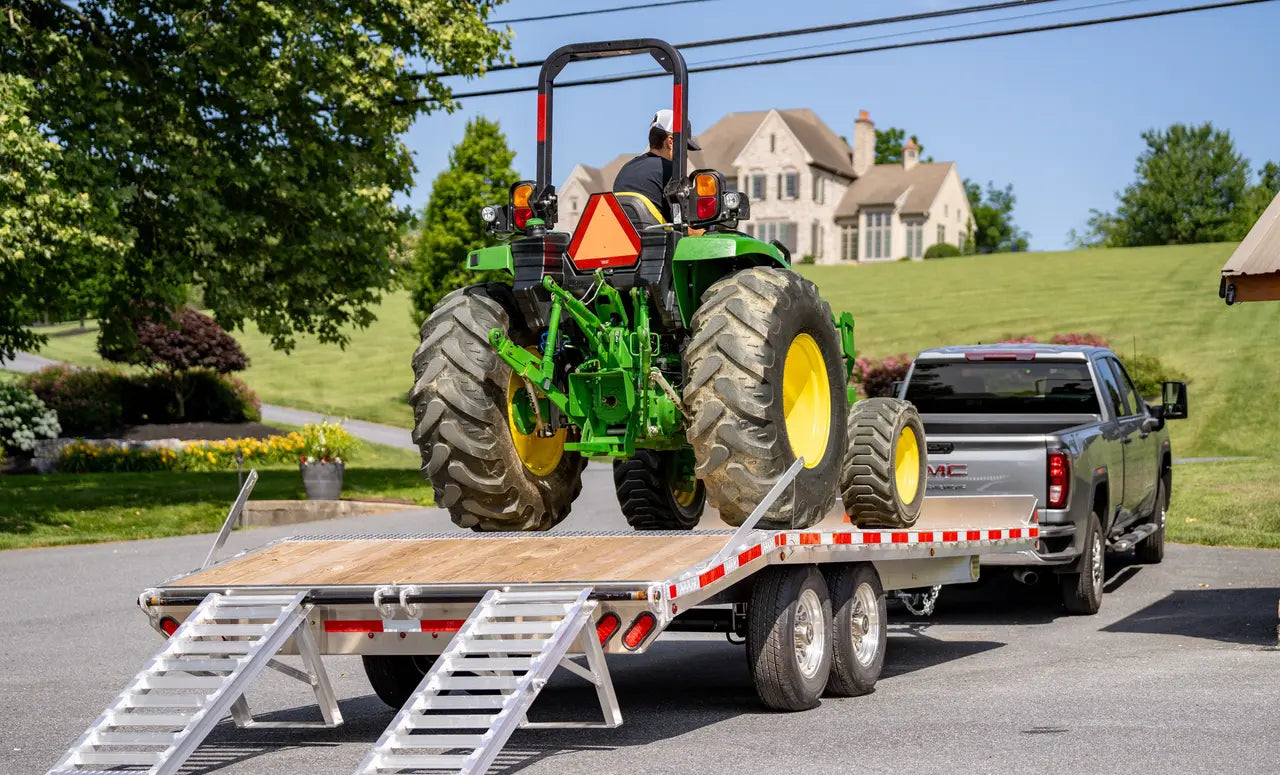 How Equipment Trailers Ensure Safety While Transporting Heavy Machinery